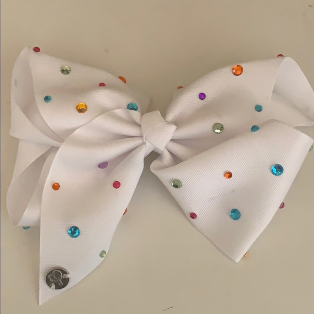 white jojo bow with rainbow rhinestones